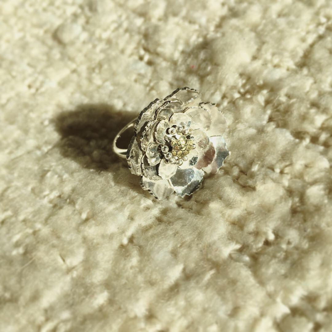 Bague articulée en argent et laiton